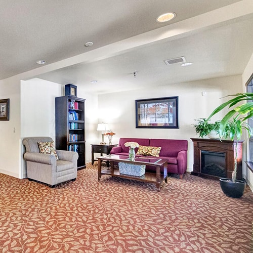 Sitting area with books at Lacamas Post Acute